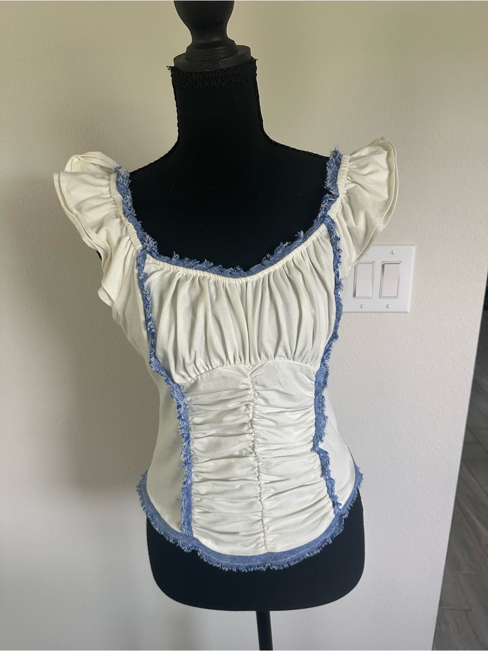Anthropologie White Top with Blue Frayed Trim